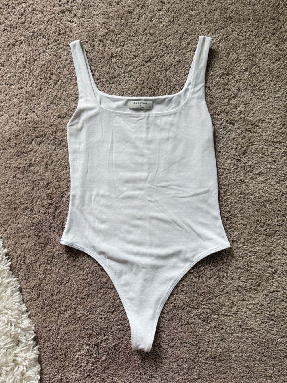 Babaton White Ribbed One-Piece Bodysuit